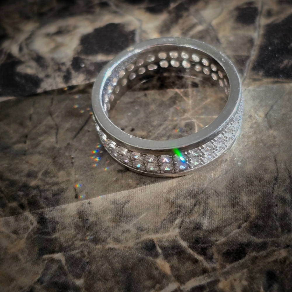This silver Fashion Ring features two rows of imitation diamonds.